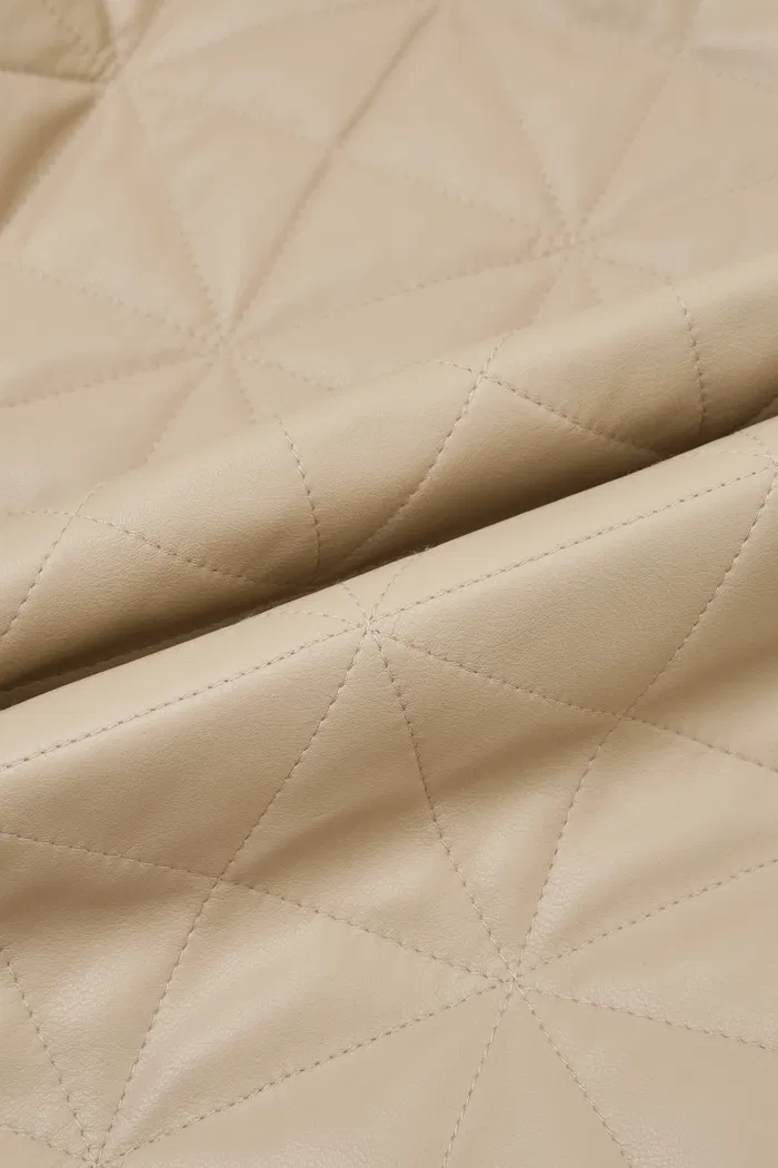 Marina Double-Breasted Puffer Coat in Vegan Leather - Image 9